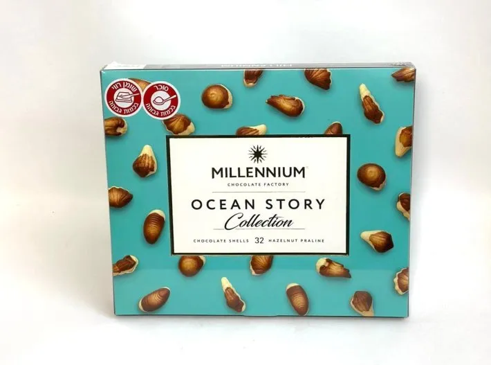 WhatsApp Image 2026-03-29 at 16.29.18 שוקולד מיליניום אושן סטורי קולקשן – קונכיות שוקולד עם פרלינה אגוזי לוז